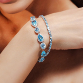 18K Blue Topaz & Diamond Tennis Bracelet - Pear and Oval Modern Design