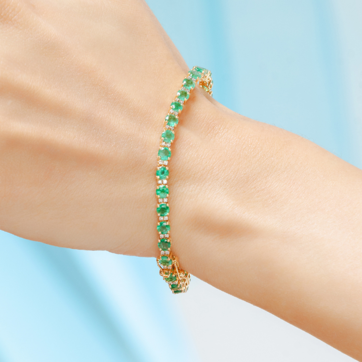 18K Gold Emerald tennins bracelets
