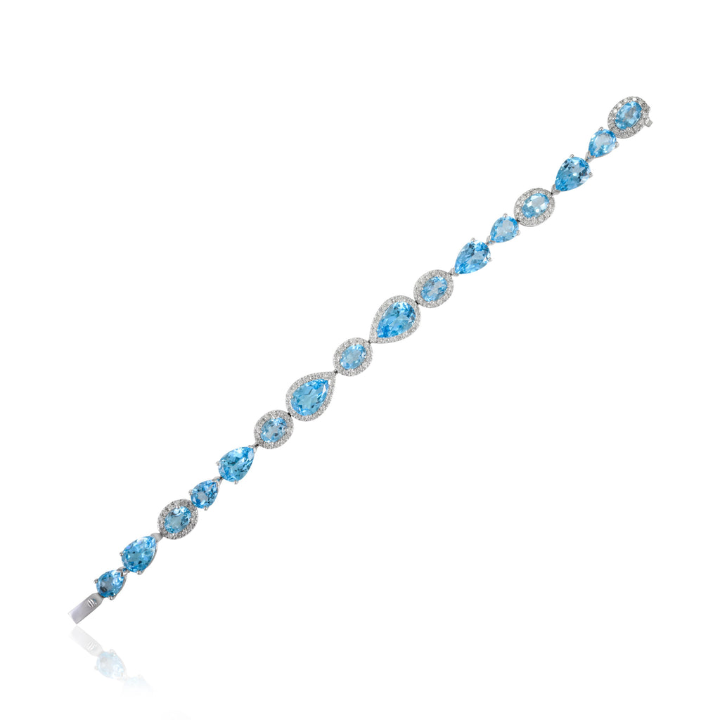 18K Gold Blue Topaz & Halo Diamond Tennis Bracelet Image
