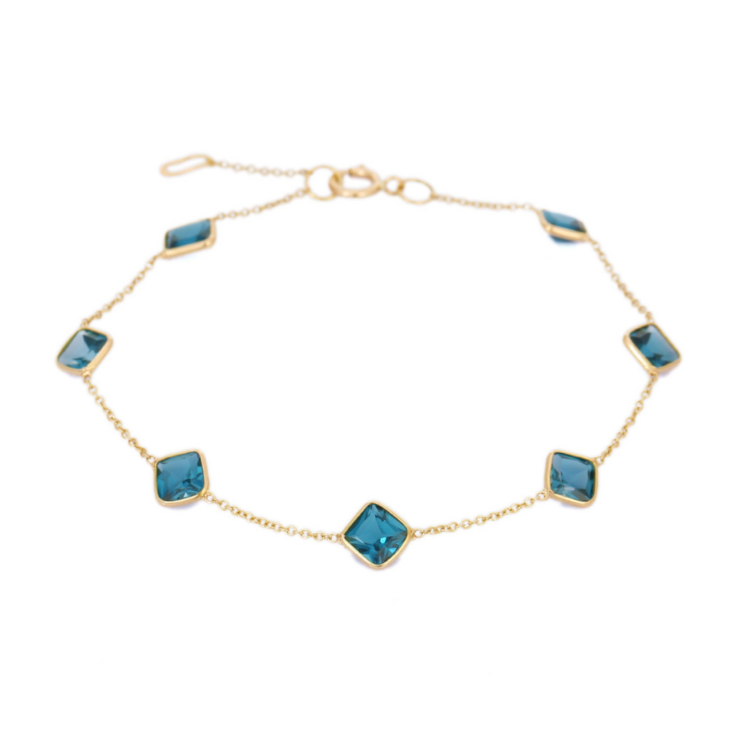 18K Yellow Gold Bracelet With Blue Topaz Gemstone Image
